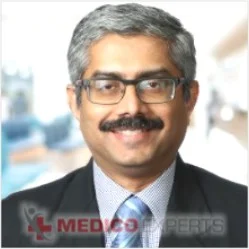 Dr. Mohan Menon